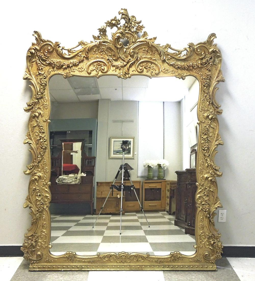 Large Decorative Rococo Style Gilt Frame Mirror.: Large Decorative Rococo Style Gilt Frame Mirror. 65" x 50".