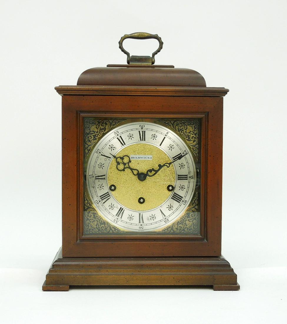 Barwick Bracket Clock.: Barwick bracket mantle clock. Time, strike and chime movement. The face marked West Germany. The works numbered 496270. Dimensions: 15 x 10 x 7 inches.