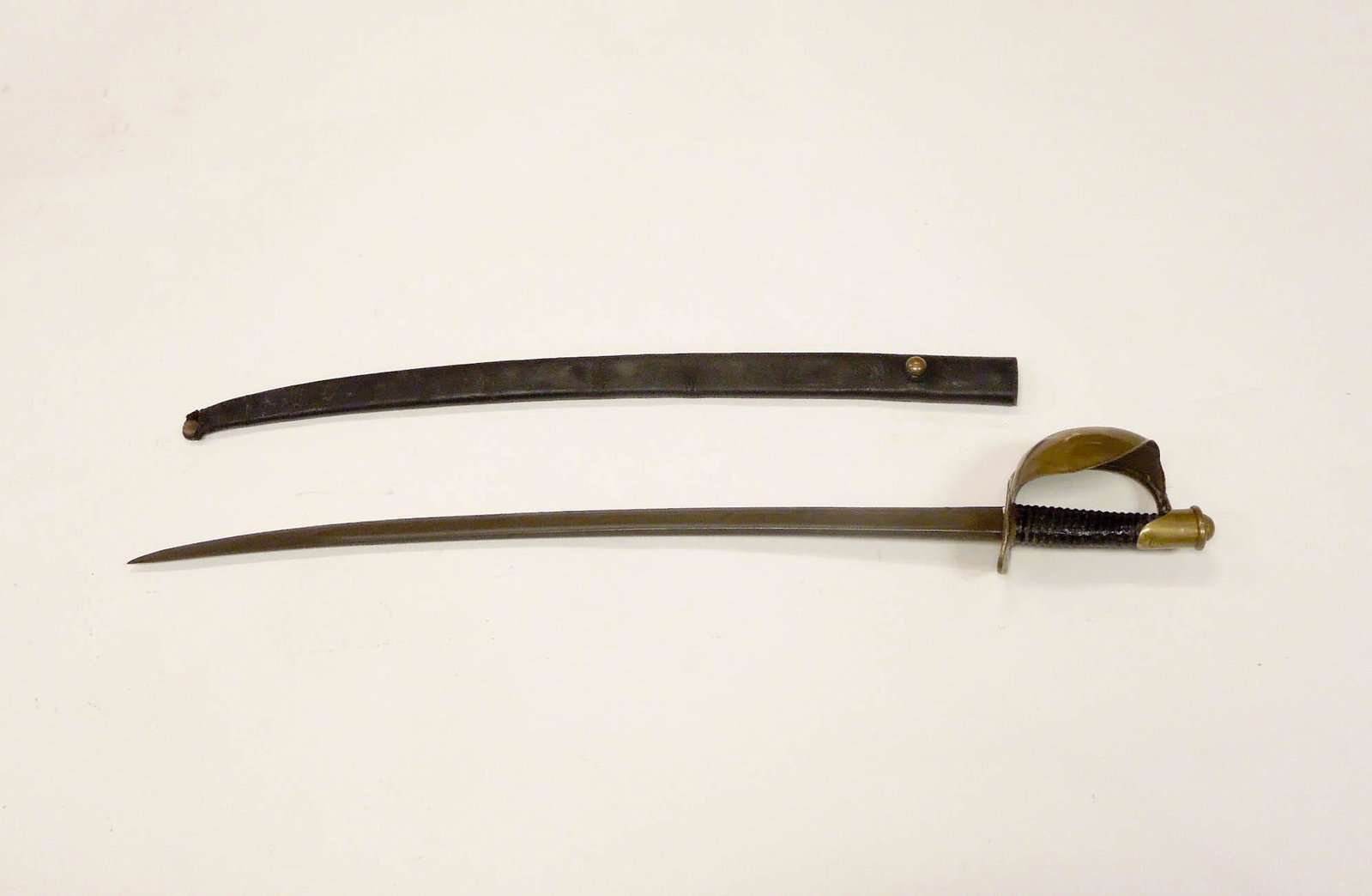 Civil War U.S. model 1860 Naval Cutlass.: U.S. model 1860 naval cutlass. Ricasso marked with anchor, P, J.R.G. 1862. No discernible makers mark on obverse ricasso. Probably made by Ames. Curved blade is approximately 26 inches long. Solid bra