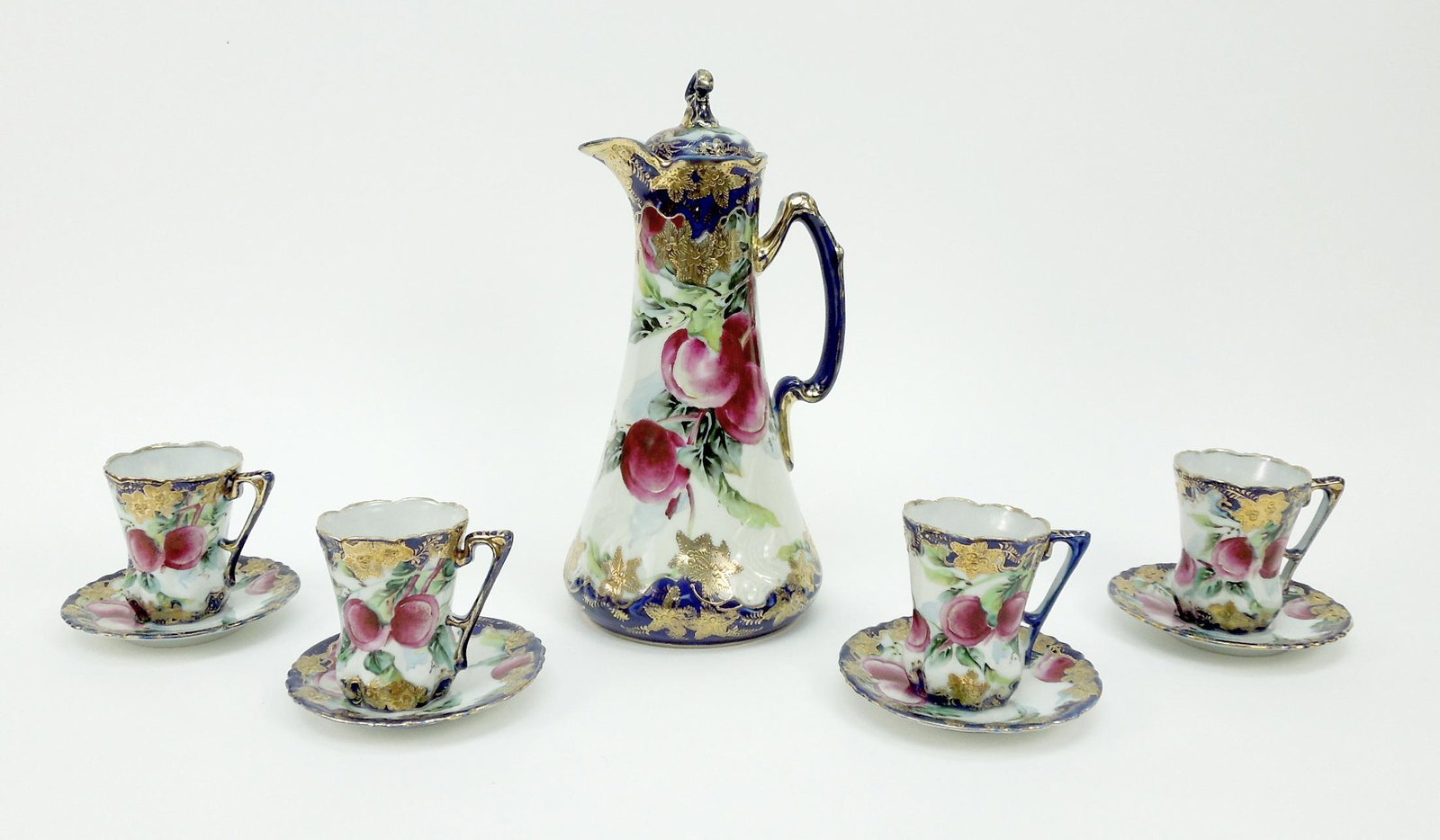 Hand Painted Nippon Porcelain Chocolate Set.: Hand painted Nippon porcelain chocolate set. Chocolate pot, 4 cups and 4 saucers.