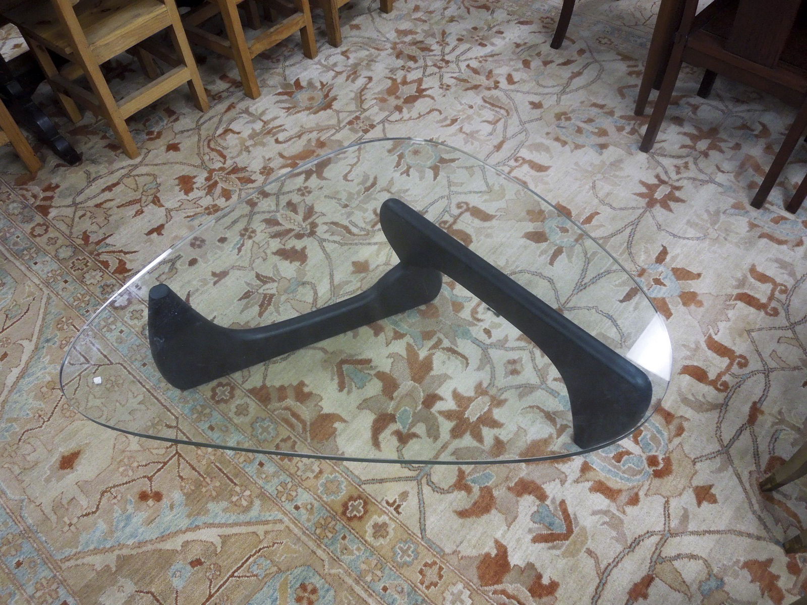 Noguchi style glass top coffee table.: Isamu Noguchi style glass top coffee table. 48.5" x 35.5", 16" H.