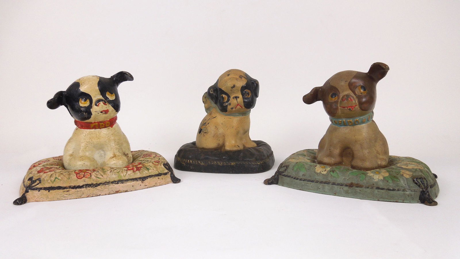 (3) Antique Puppy Cast Metal Banks, One labeled Hubley. (1 of 3)