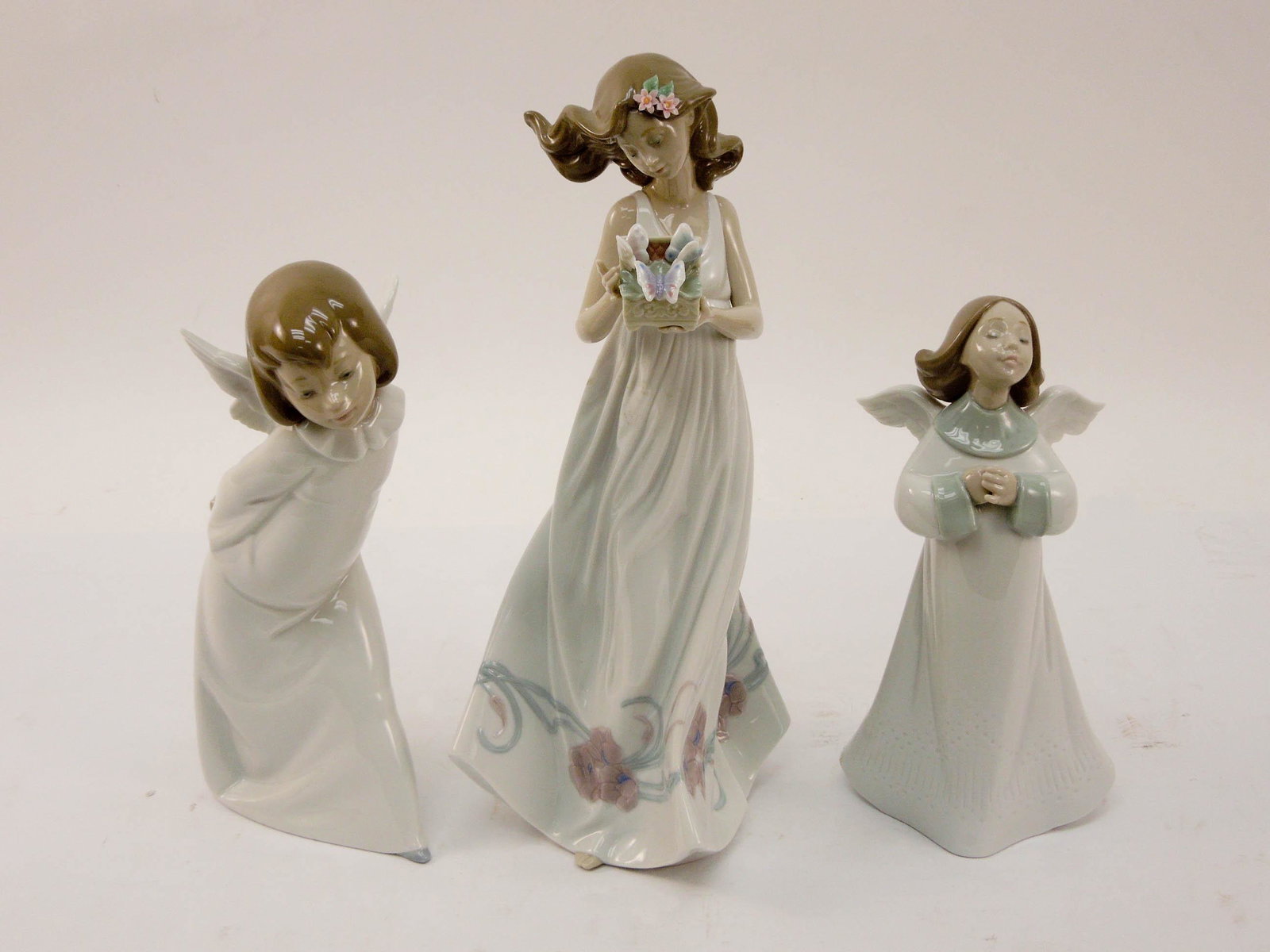 (3) Lladro Porcelain Figures. (1 of 1)