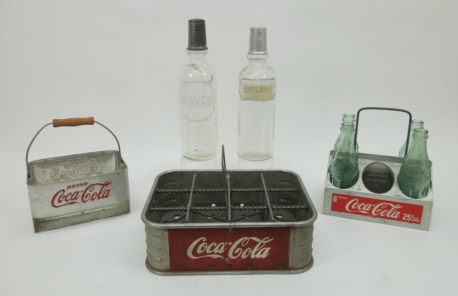 Group of Vintage Coca Cola Aluminum Cases & Bottles.: Group of vintage 1940s & 1950s Coca Cola Aluminum carrying cases, 4 early Coca Cola bottles, 2 soda fountain Coca Cola bottles.