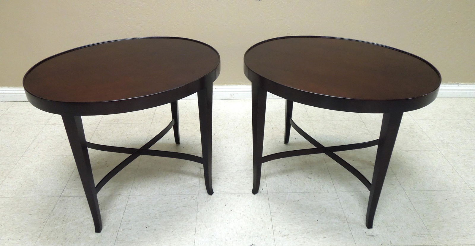 Pair of Baker "Barbara Barry" Oval Side Tables.: Pair of Baker furniture Barbara Barry Collection oval side tables, java finish. 29" x 24" x 23" tall.