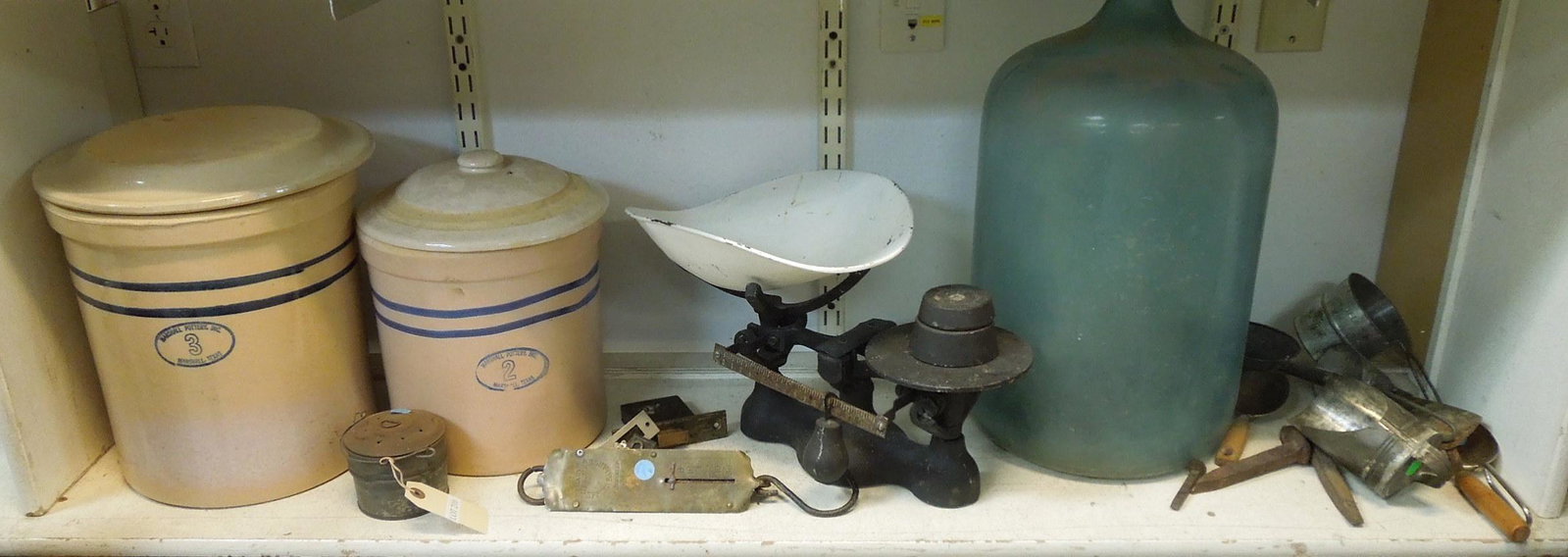Group of Vintage Kitchenware.: Group of vintage kitchenware items including stoneware crocks, bottle, scale.