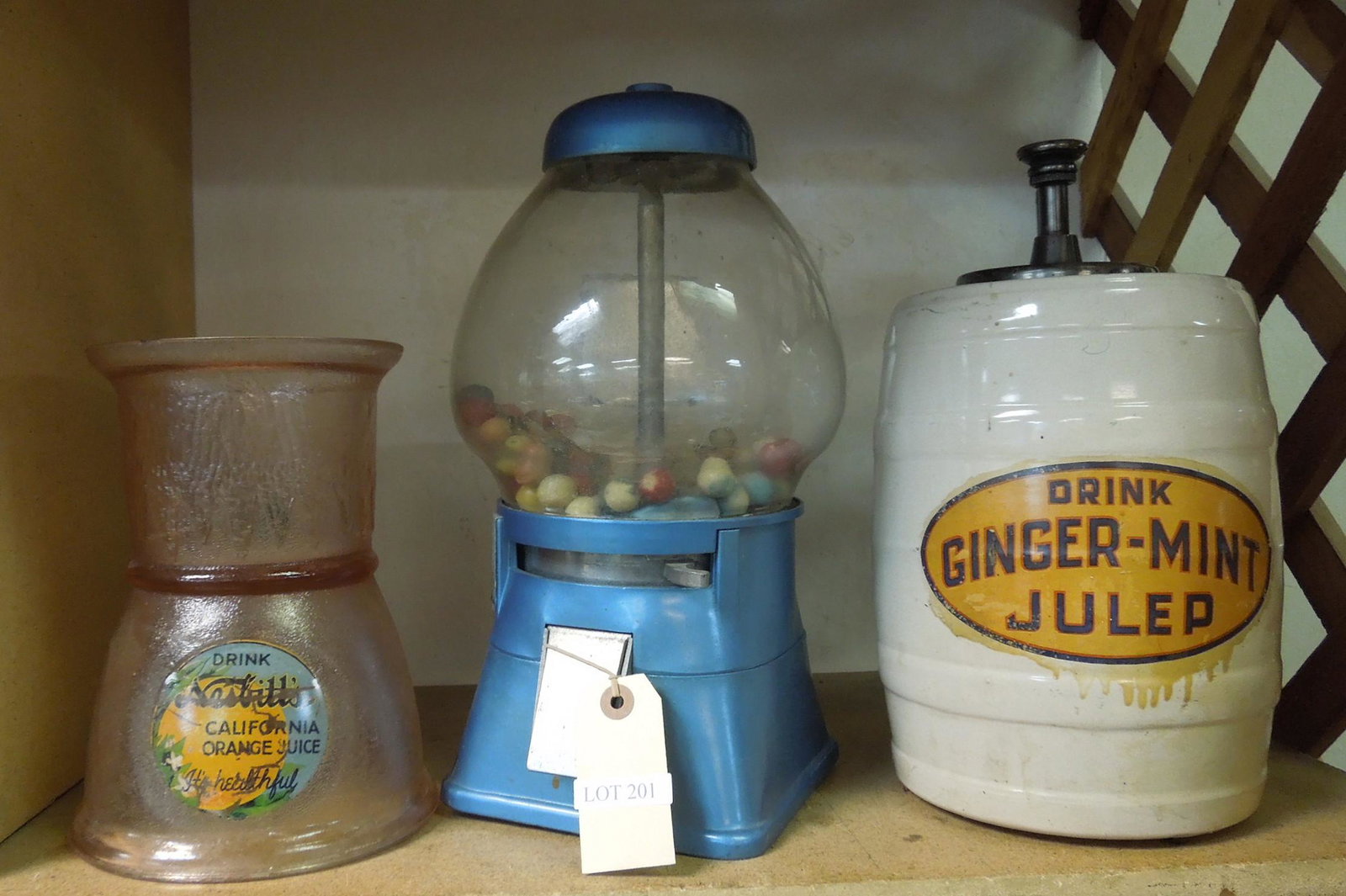 (2) Vintage Store Display Vessels & Gumball Machine.: (2) Vintage store display vessels (Ginger Mint Julep, Nesbitt's California Orange Juice) and a gumball machine.