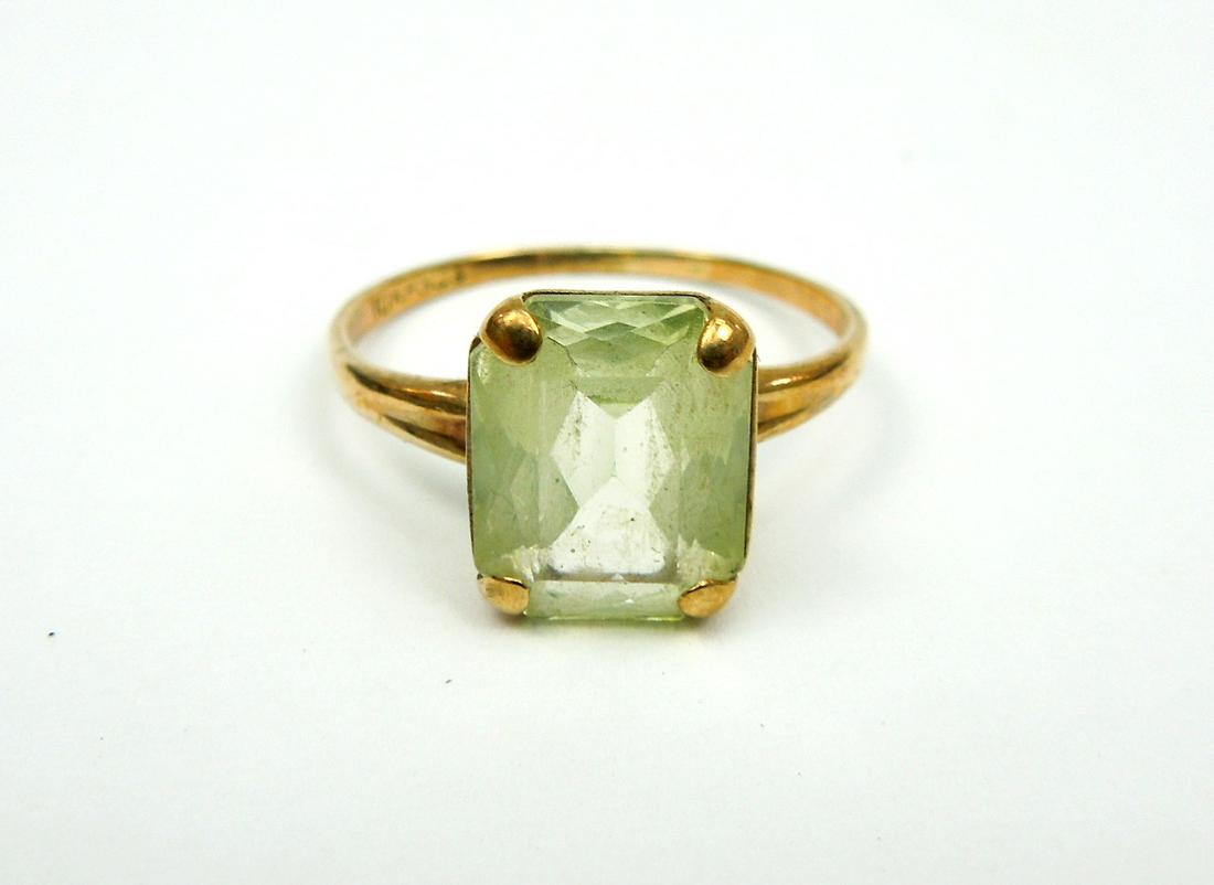 Solitaire Spinel Ring.: A rectangular faceted spinel set in a yellow gold ring stamped 10k. Spinel weight estimate 3.62 carats. Total weight 1.69 grams.