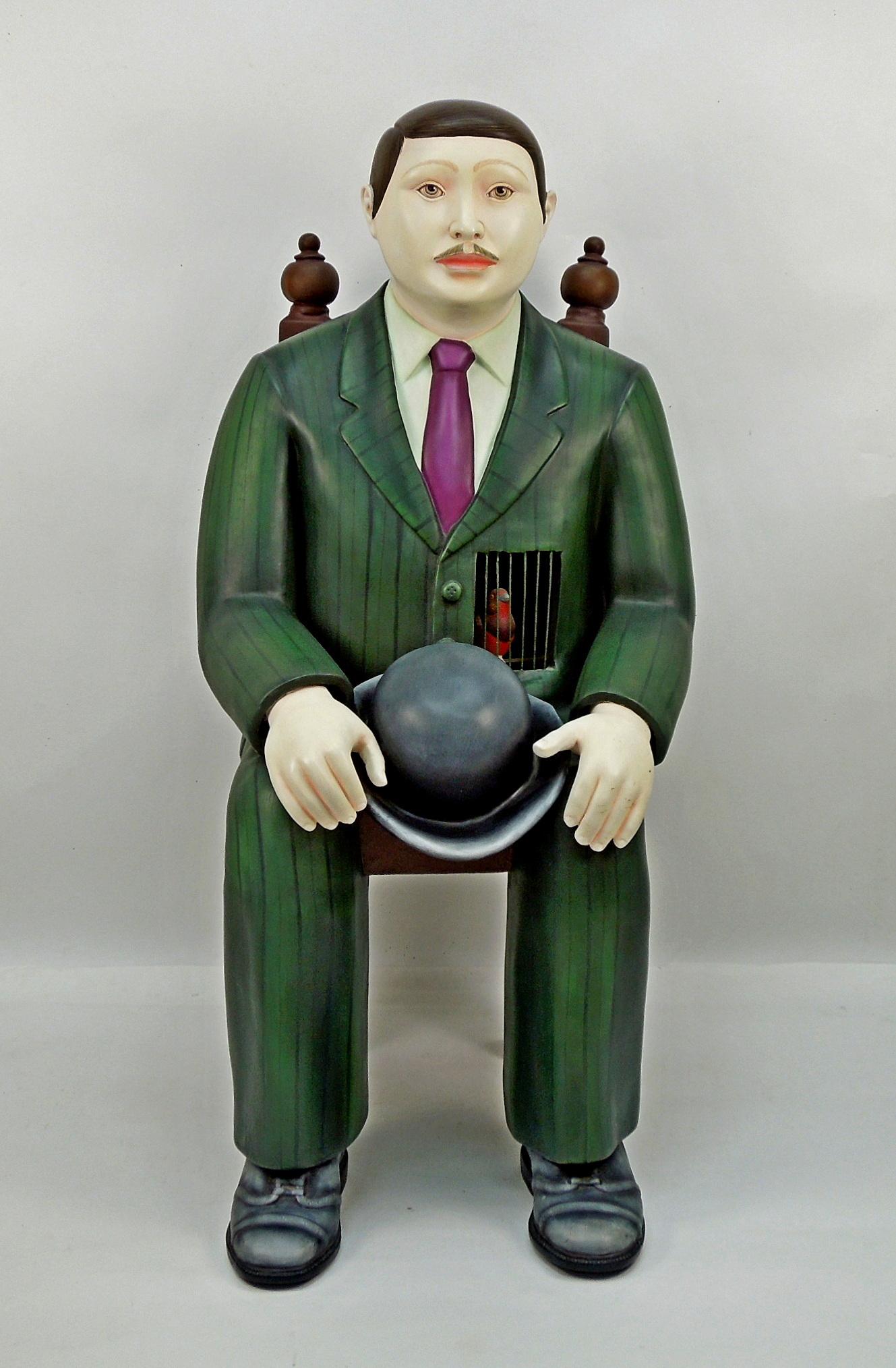 Sergio Bustamante Ceramic Sculpture, Man with Bird: Sergio Bustamante (b. 1949), Artist Proof ceramic sculpture, Man seated in a chair holding his hat, with "bird cage" inside his left vest. Signed Sergio Bustamante A.P. 22" W, 24" D, 43" H. With a lat