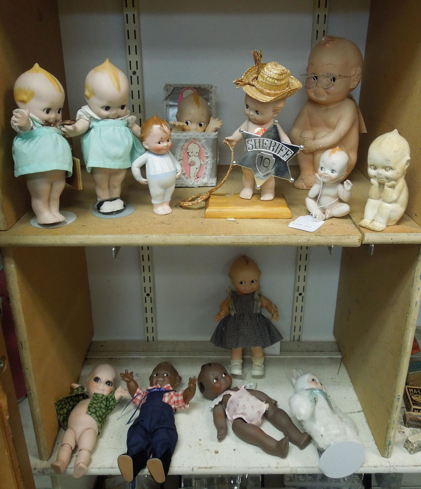 Group of (13) Kewpie Dolls & Figurines. (1 of 3)