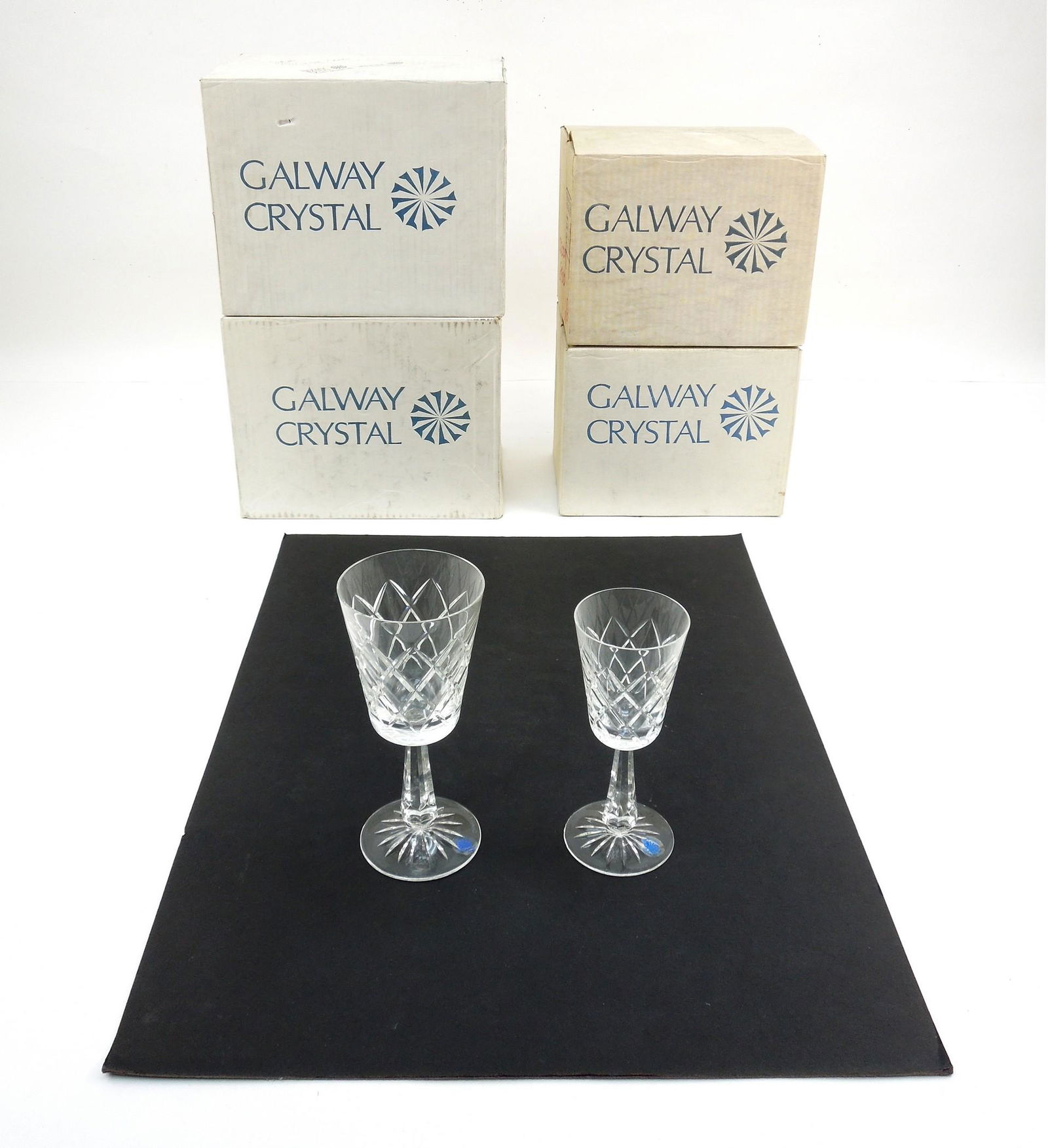 (2) Sets of Galway O'Brien Crystal Stems.: (2) Sets of Galway crystal stems, O'Brien (cut base) pattern. (12) Water glasses (7 3/4 inches) & (12) Red Wine glasses (6 3/4 inches).