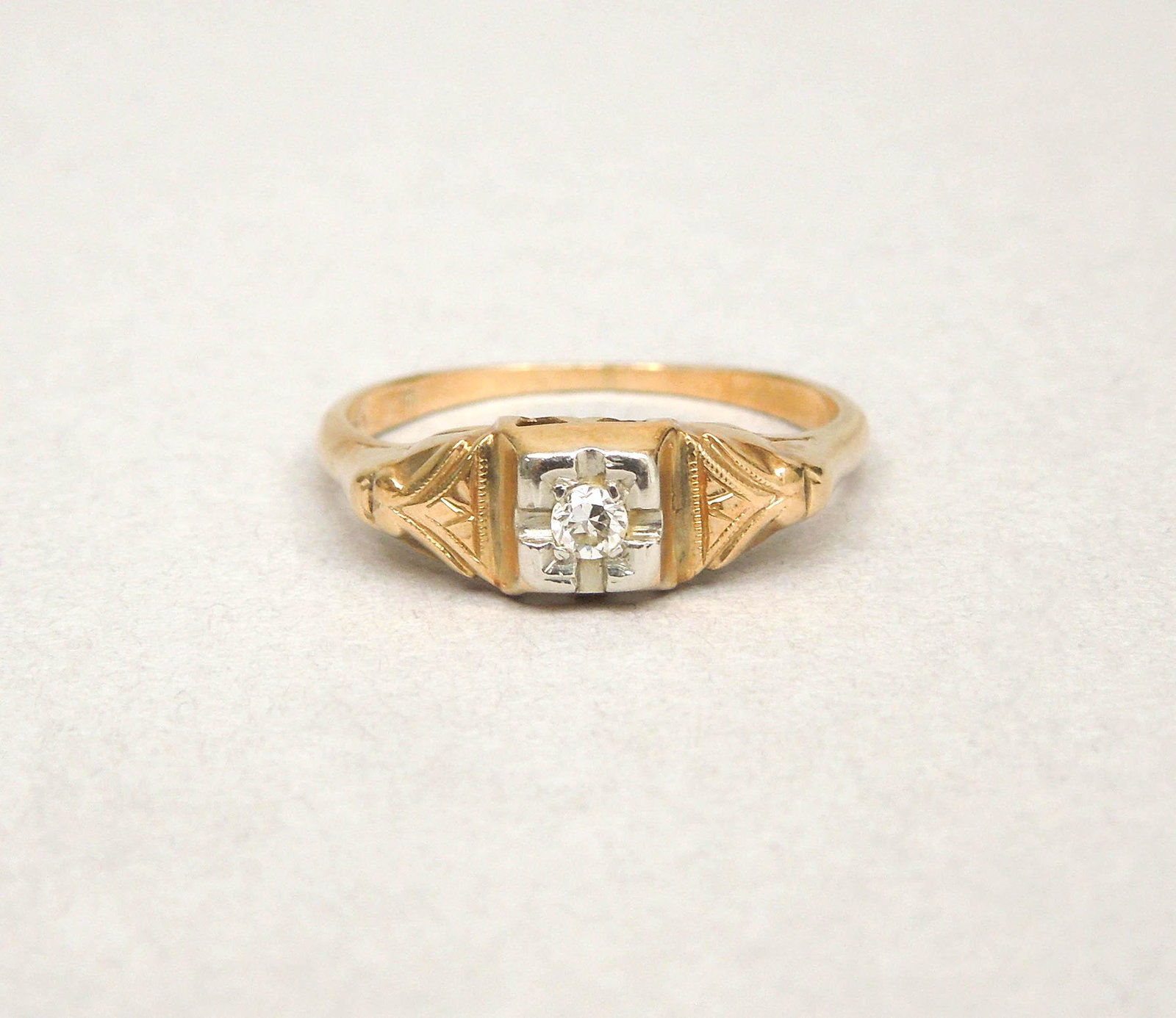 14K Yellow & White Gold Ring with Accent Diamond.: 14K Yellow gold ring with accent diamond. 1.6 grams, size 6 3/4. Marked 14K.
