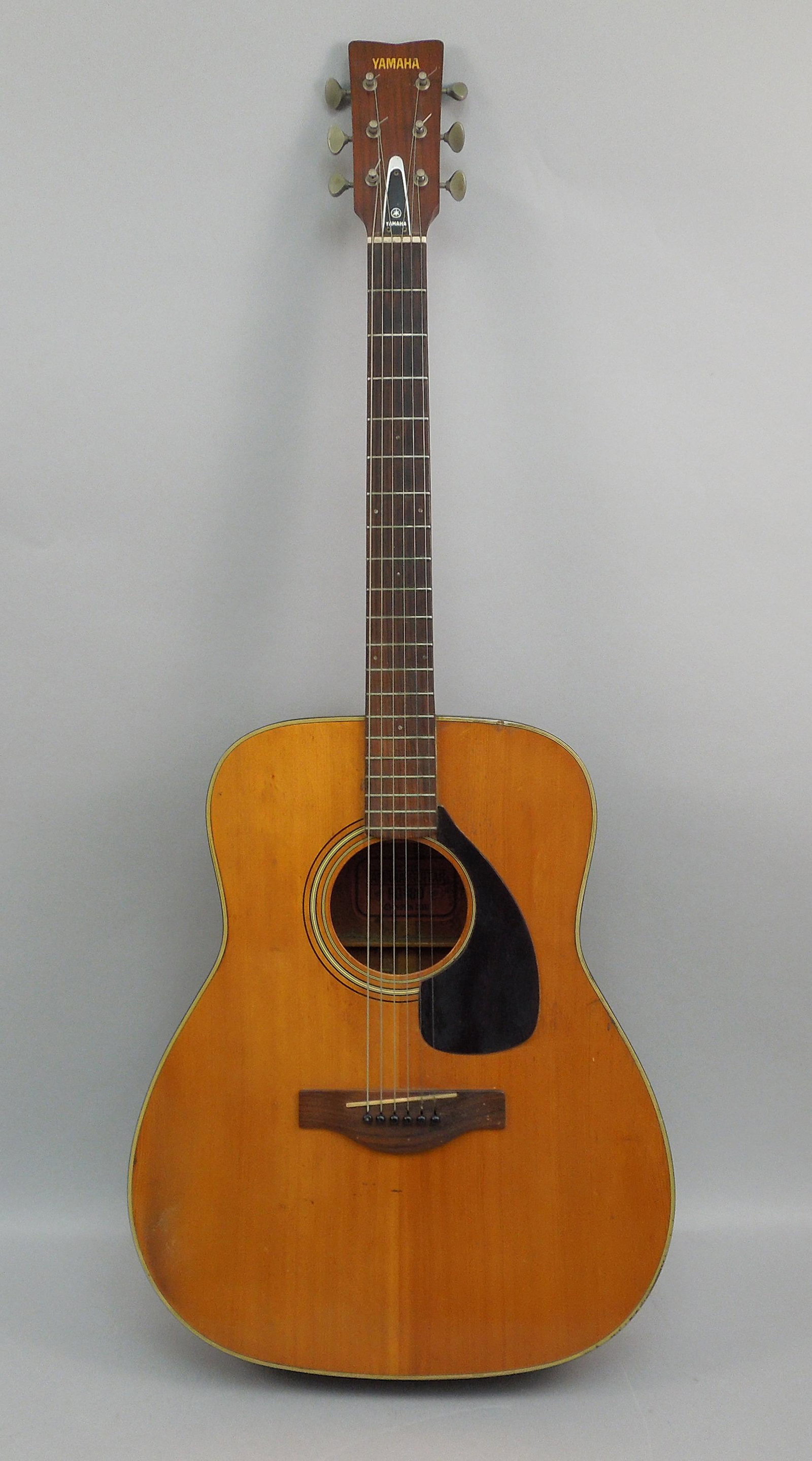 Yamaha FG-180 â€œRed Labelâ€ Acoustic Guitar.: Yamaha FG-180 â€œred label” Nippon Gakki,. acoustic guitar, serial number 1421088. Circa late 1970s early 1971. With a TKL hard case.