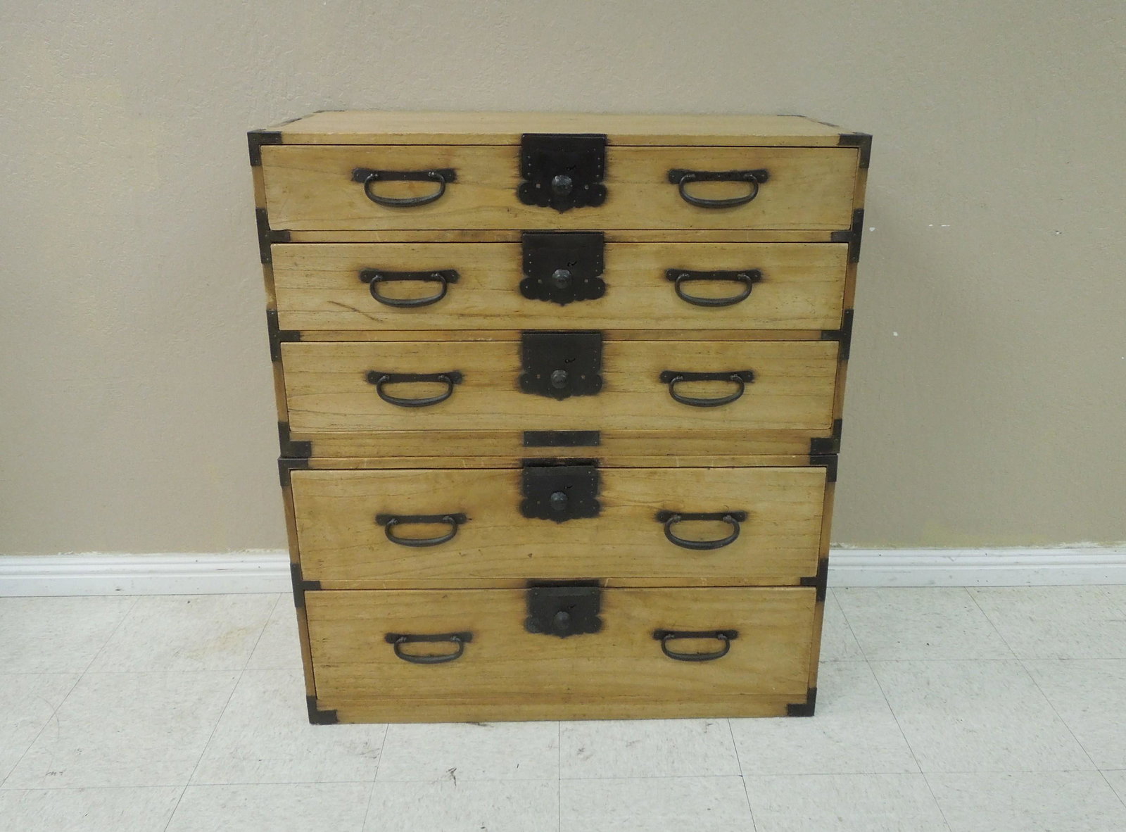 Japanese 2-Section Tansu Chest.: Japanese 2-section tansu chest. Upper section with 3 drawer and the lower section with 2 drawers. Wrought iron pulls and lock panels with handles. 36" W, 18"D, 40.5" H.