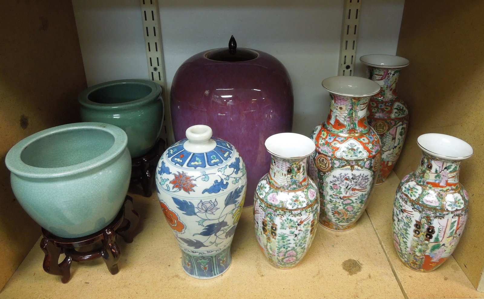 Group of Contemporary Oriental Vases & Ginger Jar.: Group of (5) Contemporary Oriental porcelain vases, lidded ginger jar and 2 small planters on stands. Ginger jar: 12 inches tall.