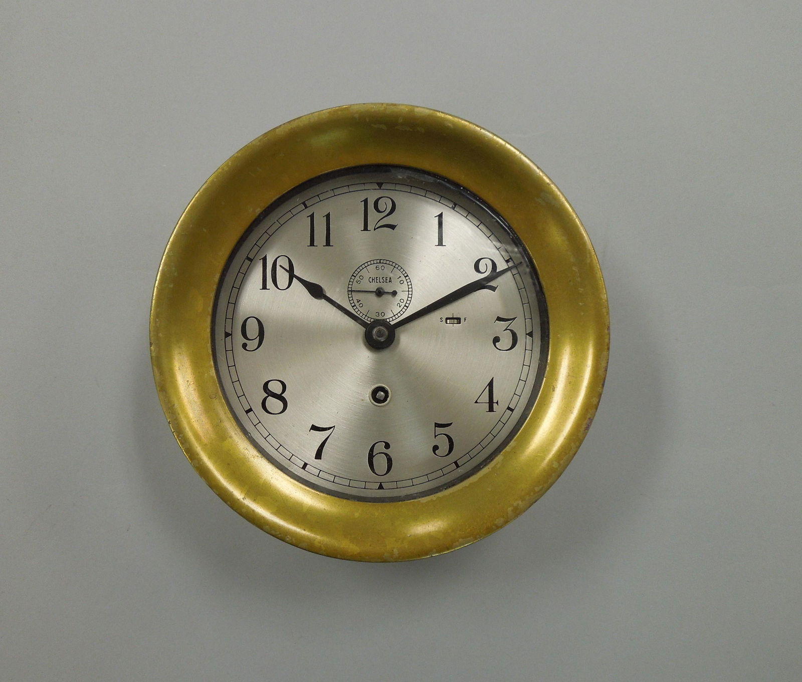 Vintage Chelsea Ship's Bell Clock.: Vintage Chelsea Ship's Bell clock with subsidiary seconds dial. 7 1/4 inches diameter.