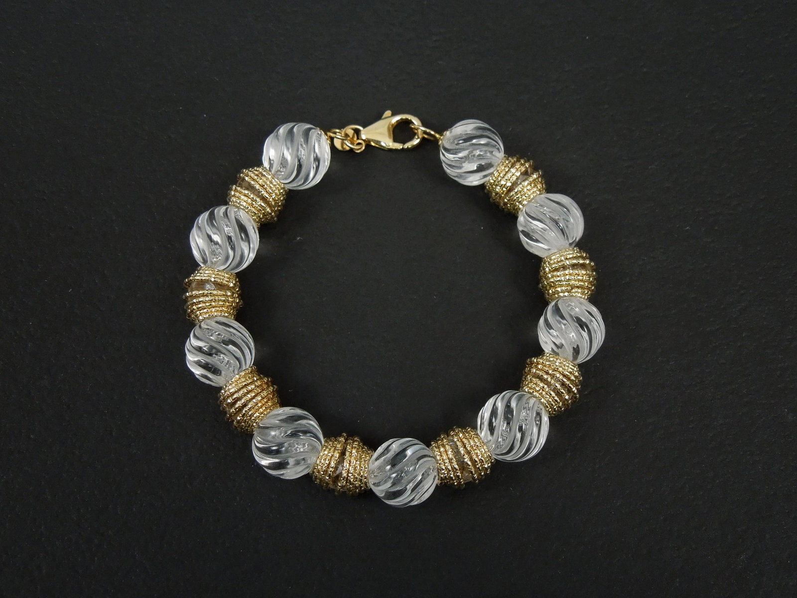 Milor 14Kt Gold & Crystal Bracelet.: Milor 14Kt gold and crystal bead bracelet. 7 inches long. 29 grams total.