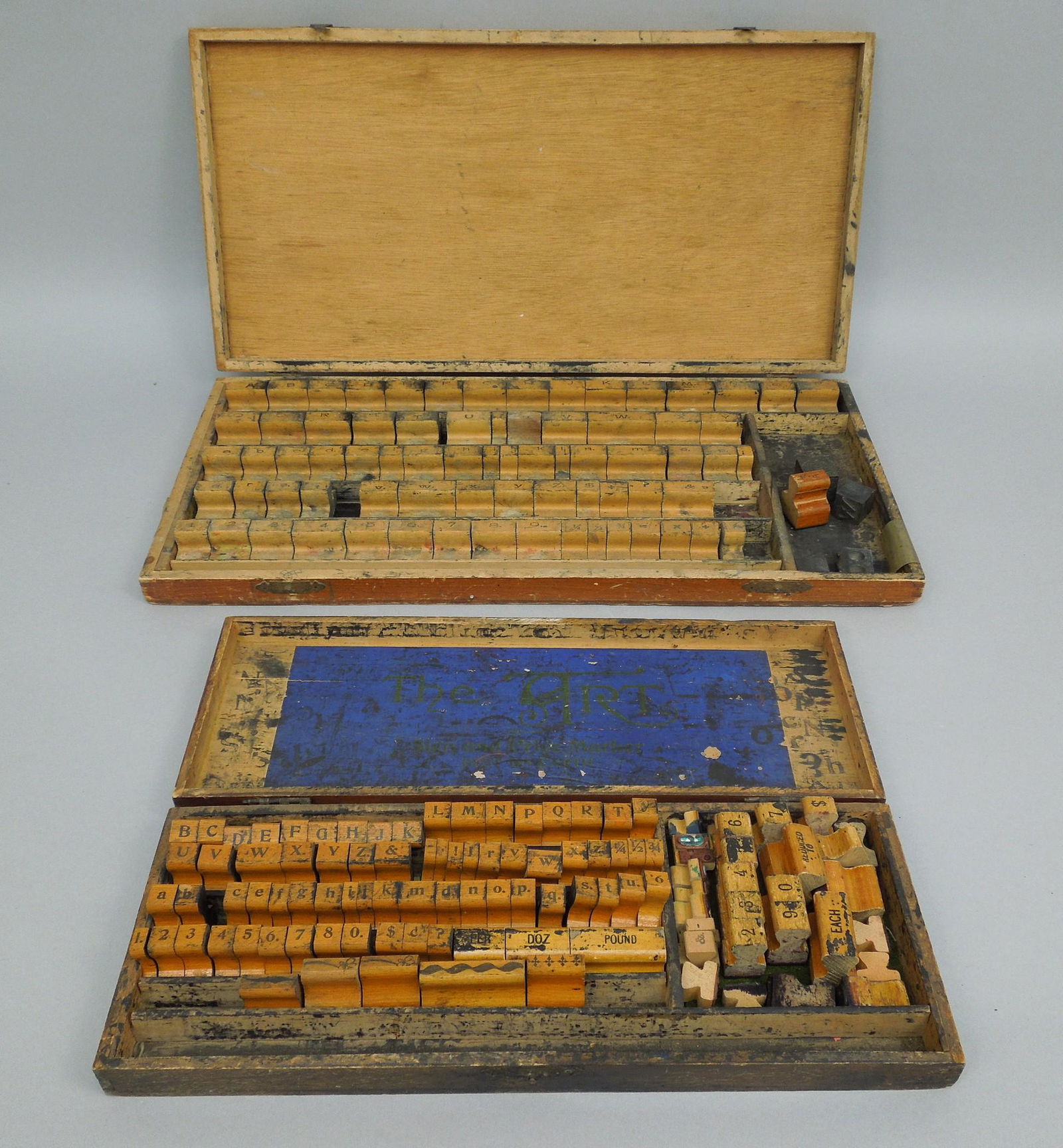 (2) Early 20th C. Cased Sets of Pricing Stamps. (1 of 4)