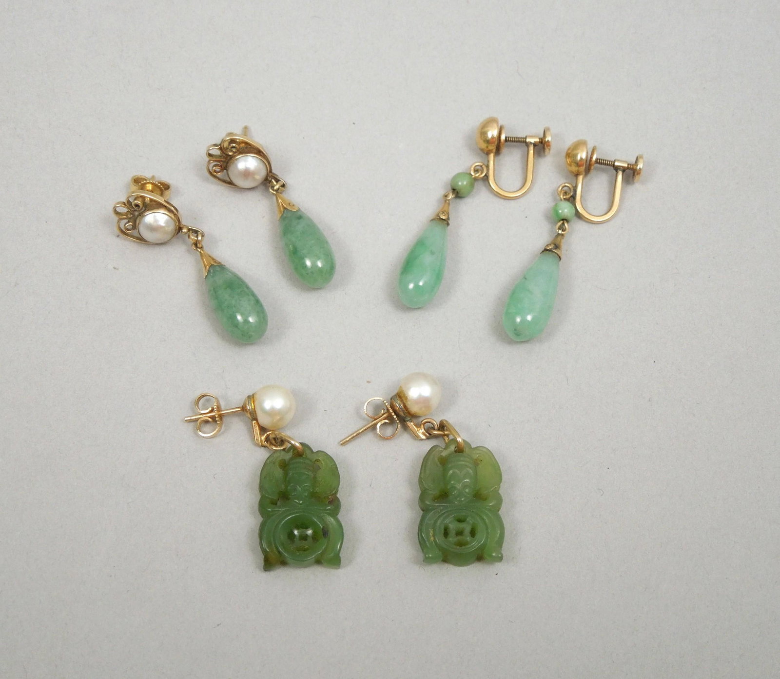 (3) Pairs of Yellow Gold & Hard Stone Earrings.: (3) Pairs of yellow gold and green hard stone earrings. Marked 14K. 18 grams total.