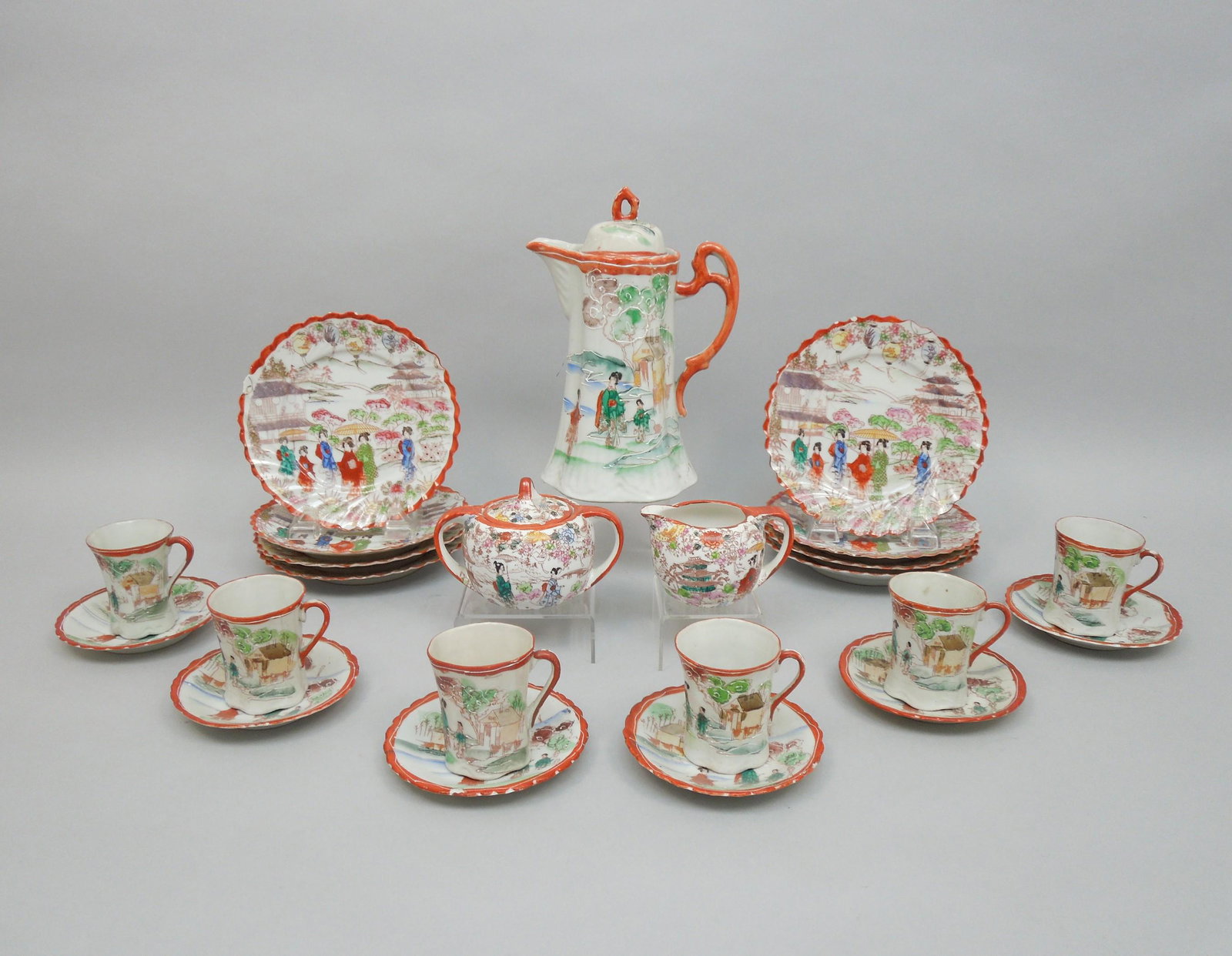 Japanese Porcelain Luncheon Service.: Japanese porcelain luncheon service. Teapot, sugar bowl, creamer, 6 cups, 6 saucers and 8 luncheon plates. Teapot: approx. 9 1/2" tall.