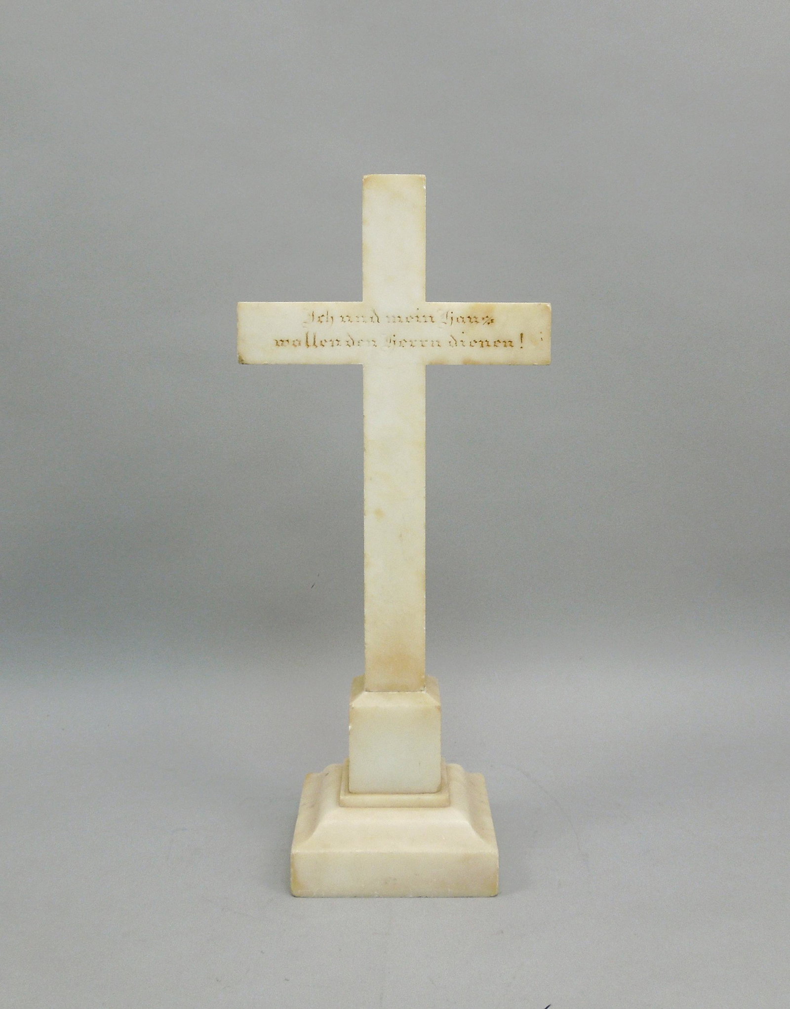 Alabaster Table Top Cross.: Alabaster table top cross with German inscription. 18 3/4 x 8 1/4 inches.