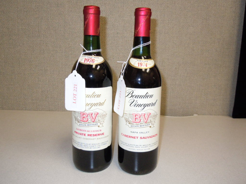 (2) Bottles of Beaulieu Vineyard Cabernet Sauvigno: (2) Bottles of Beaulieu Vineyard Cabernet Sauvignon (1976 Georges De Latour Private Reserve and 1974 Cabernet). (bottom neck).