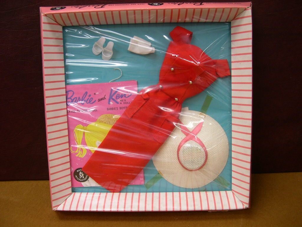 (6) Vintage Barbie Clothing Sets: (6) Vintage Barbie Clothing Sets: No. 986 Sheath Sensation No. 921 Floral Petticoat No. 923 Barbie Accessories No. 918 Cruise Stripes No. 933 Movie Date and 1 other Barbie Fashion Swimsuit on Hanger w