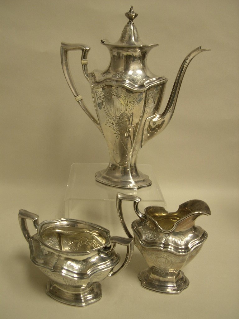 Reed & Barton Hepplewhite Sterling Coffee Service: Reed & Barton “Hepplewhite” 3-piece Sterling Silver Coffee Service consisting of Coffee Pot with hinged lid. Creamer and Sugar with gilt-wash interior. Each piece with a 3-letter monogram “MRD��
