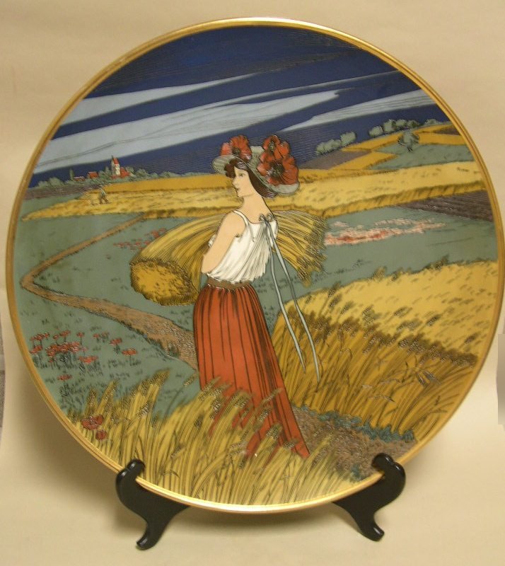 Mettlach Villeroy & Boch Art Nouveau Charger #2899: Mettlach Villeroy & Boch Art Nouveau Charger #2899, depicting a maiden in a bucolic landscape, gathering hay, her hat covered in red poppies. Diameter: 17 ½ inches