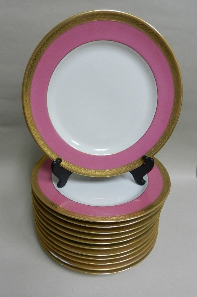 Set of 12 Bernardaud Limoges Porcelain Plates: Set of 12 Bernardaud, France, Limoges Porcelain Plates, retailed by Gumps San Francisco, having a white center, encircled by a pink band, decorated with a gilt rim band. Diameter: 10 inches