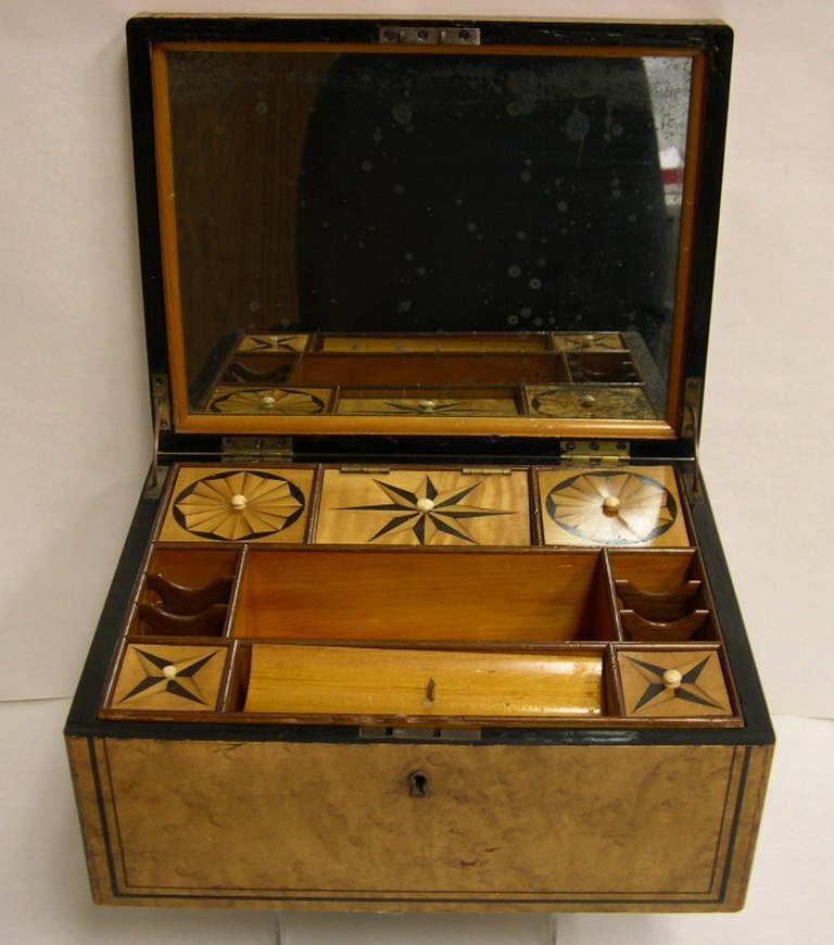 Circa 1930s Sewing box: Sewing Box, burlwood and inlaid mixed woods, interior fitted with a mirrored lid, a removable tray comprising of nine compartments, some with lids, and the base having a single compartment centered by