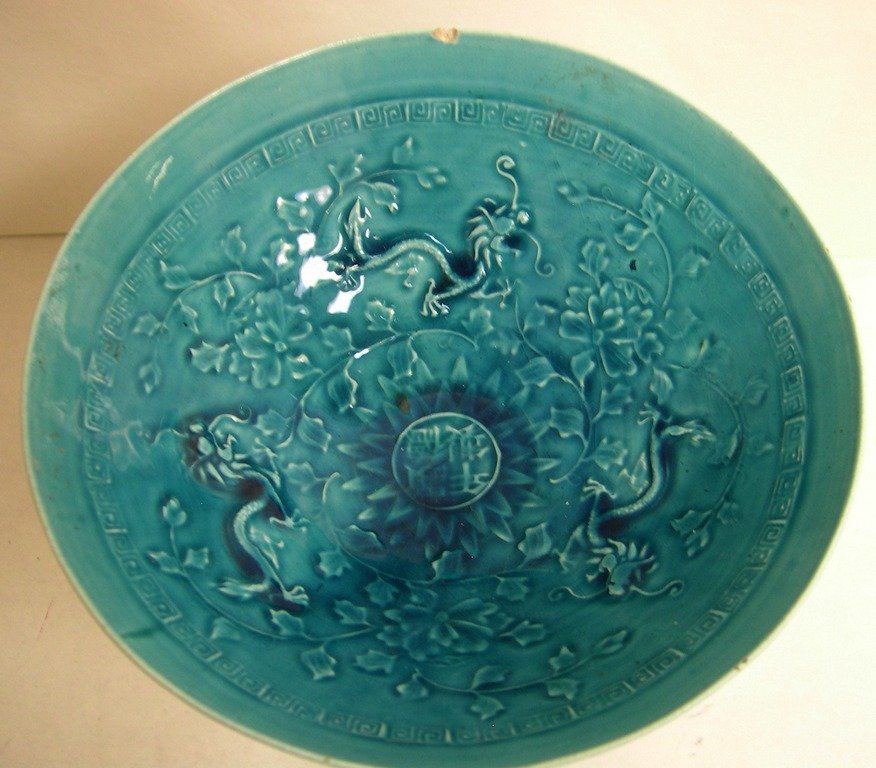Chinese Turquoise Bowl Dragon with Flowers: Three dragons and flowers decorate interior of bowl. An incised mark read: "Xuan De Nian Zhi" on interior bottom. Diameter: 7 5/8 inches