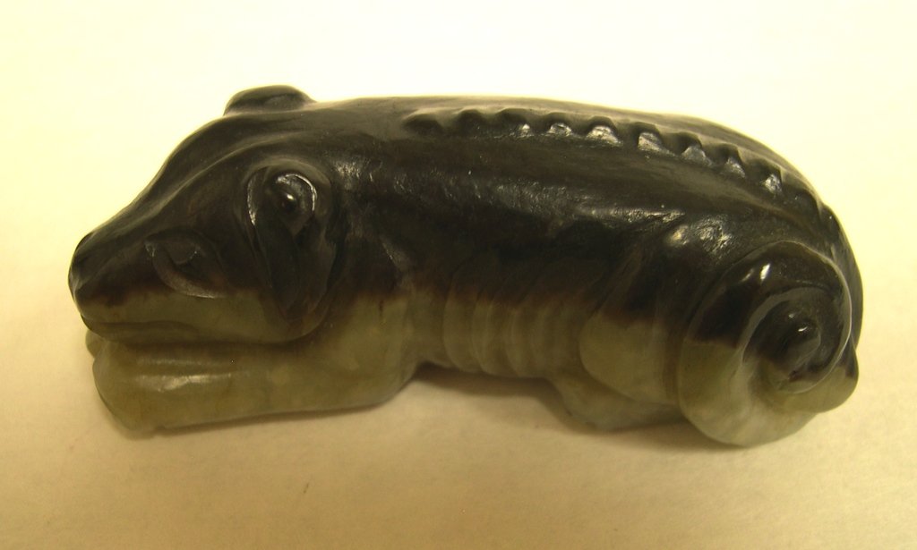 Chinese Black & White Jade Carving Recumbent Dog: Size: 2 1/2 x 1 x 3/4 inches. Ming Dynasty. From a professional private collection.