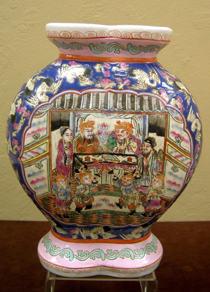 Famille Rose Porcelain Double Vase. 19th/20th Century.: Famille Rose Porcelain Double Vase. 19th/20th Century. Depicting figures in center, Cranes around the shoulders on each side. A red six character seal: "Da Qing Jia Qing Nian Zhi" on base. Height: 12 