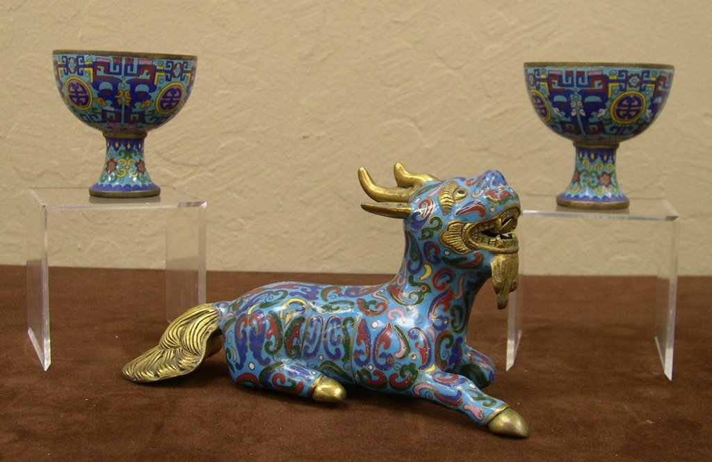 Three Gilt Bronze Enamel Cloisonne Items. Comprising a: Three Gilt Bronze Enamel Cloisonne Items. Comprising a pair of Cups and a Beast. Late 19th Century. Height Beast: 4 1/4 inches.