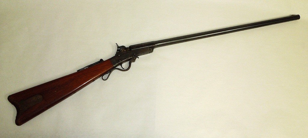 Maynard Arms Co First Model Rifle, Civil War era, circa: Maynard Arms Co First Model Rifle, Civil War era, circa 1860. The rifle is a .50 caliber percussion cap rifle, serial no: 2747, with a 26” barrel. The tape primer system is intact and contains a tap