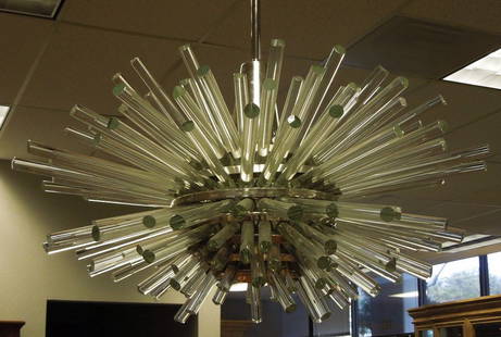 Modernist Polished Metal and Glass Chandelier: Modernist galactic polished metal orb form issuing bursts of glass cylindrical rods. Takes single center bulb. 36 x 30 inches.