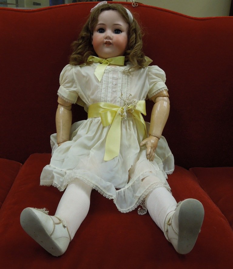 Armand Marseilles Bisque Child doll.: Armand Marseilles Bisque socket head child doll. Blue glass sleep eyes, open mouth, upper teeth, on jointed composition body. Back of the head impressed: Armand Marseilles Germany 390 A 14 M. (Approx.