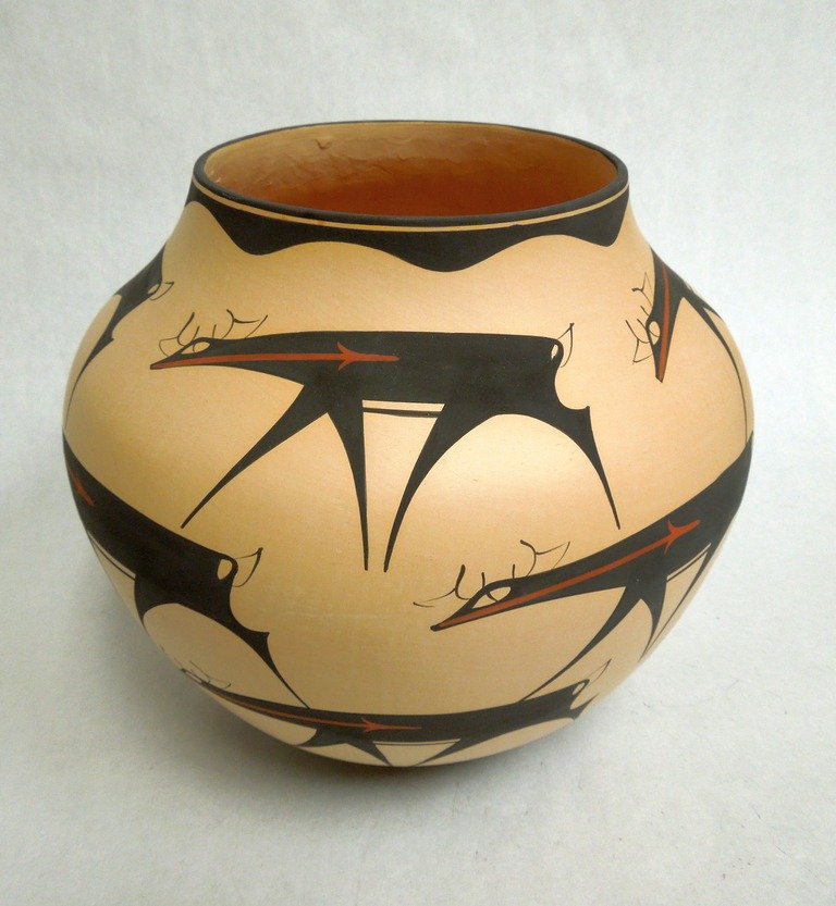 Zuni Earthenware Pot, Andersen Peynetsa: Zuni earthenware pot (olla), signed A. Peynetsa. Heartline deer painted in black throughout the body with black border at the top and the bottom. (Approx. 8 1/2" tall, 5 1/4" diameter at the rim, 9" a