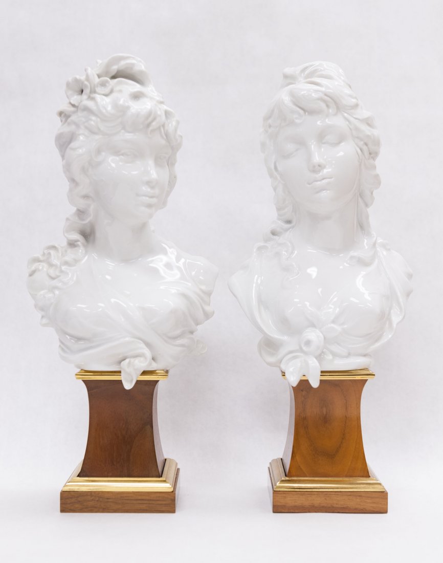Pair of Royal Worcester Porcelain Busts.: Pair of Royal Worcester white porcelain busts on wood and gilt metal plinths, titled: "Day" and "Night". Signed. (Approx. 13" tall).