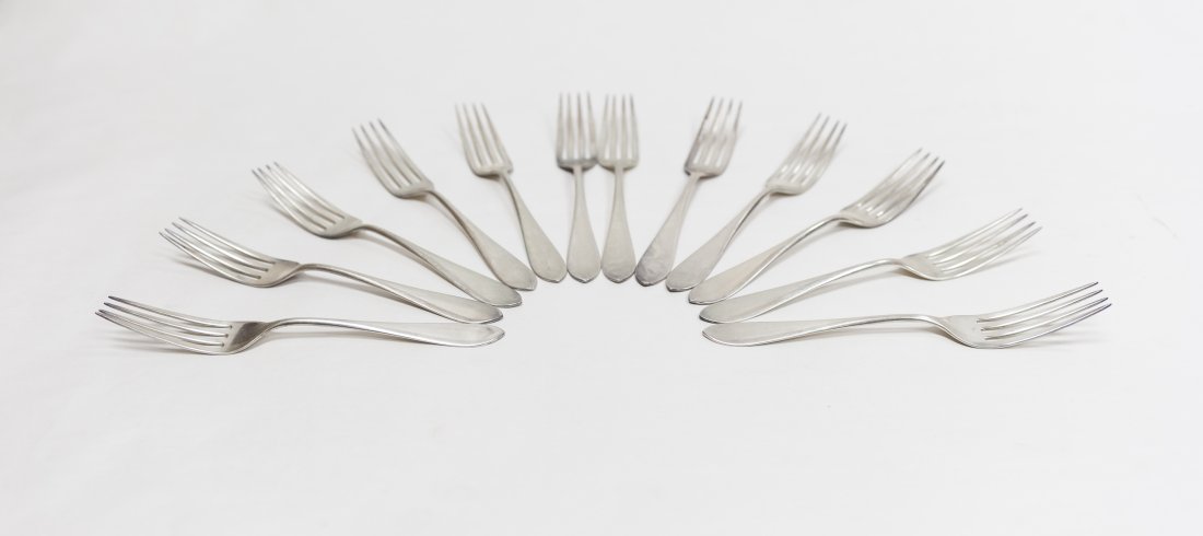 (12) Sterling Silver Forks.: Set of (12) Frank Smith sterling silver forks. Marked D. Low & Co. with Frank Smith hallmark. (Approx. 7" long, 14.09 ozt).