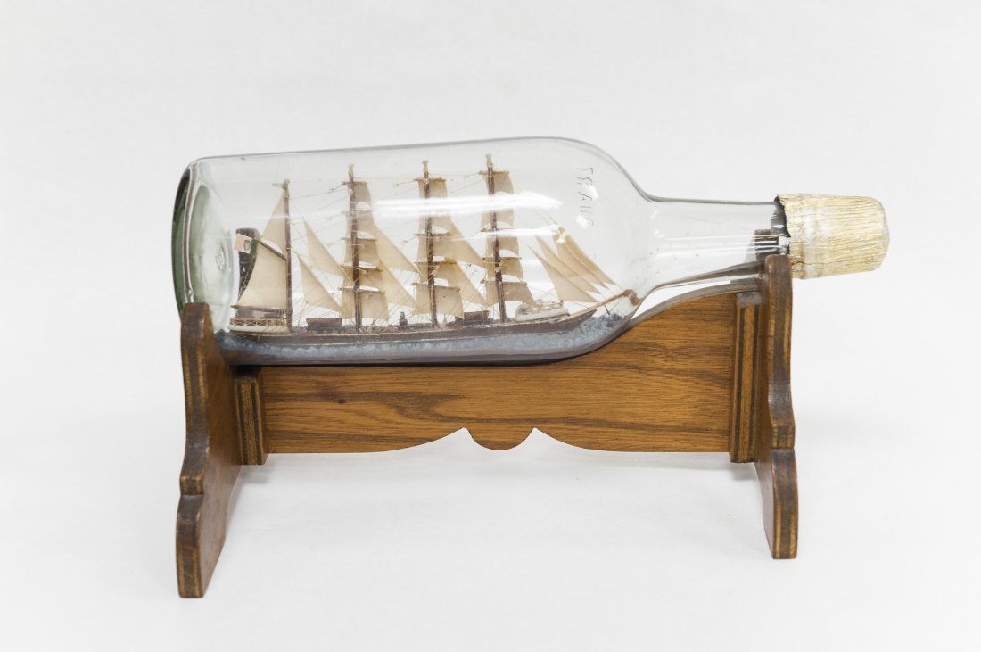 Ship in a Bottle, Barque.: A ship in a bottle, the ship a 4-masted barque. Bottle approx. 3-1/2 inch diameter, 11 inches long.