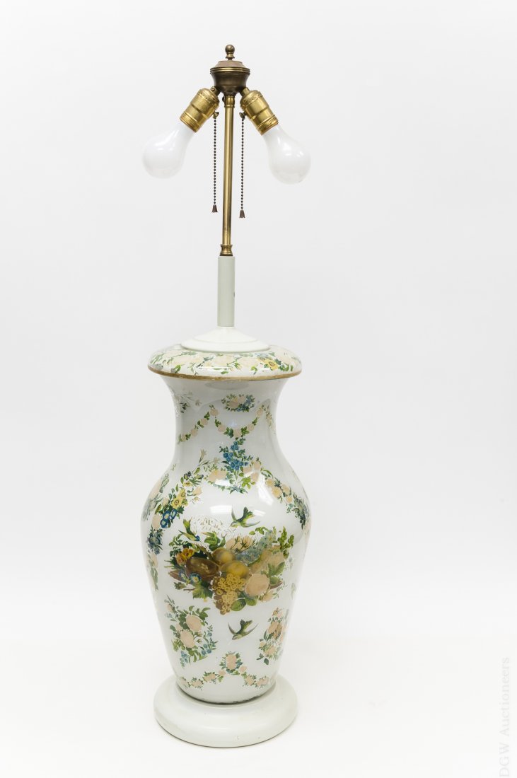 Vasiform Glass Lamp.: Large vasiform glass base 2 light table lamp, reverse painted and stencil decoration of floral garlands and sprays and birds on a white ground. Fitted on a circular base. (Approx h. glass vase 23" ove