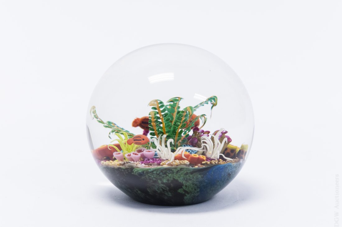 Cathy Richardson Art Glass Paperweight.: Cathy Richardson art glass paperweight. Depicts three gold fish swimming over a bed of multi-colored stag coral and sea plants. (Approx. 2 1/2" x 3 1/4"). From the Collection of Eric Sinizer.