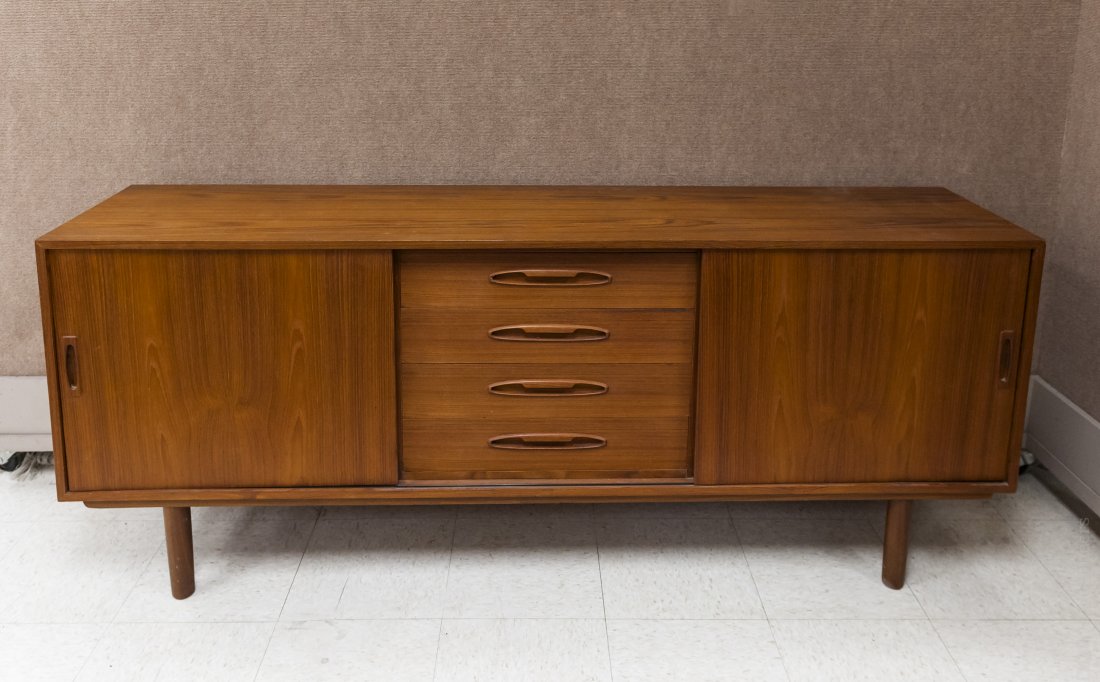 Mid 20th Century Modern Teak Sideboard.: Mid 20th Century modern Danish teak sideboard with left and right shelved compartments and 4 central drawers. Stamped in drawer and on rear PP Mobler, Denmark. (Approx. 29 3/4" tall, 71" wide, 15 1/2"