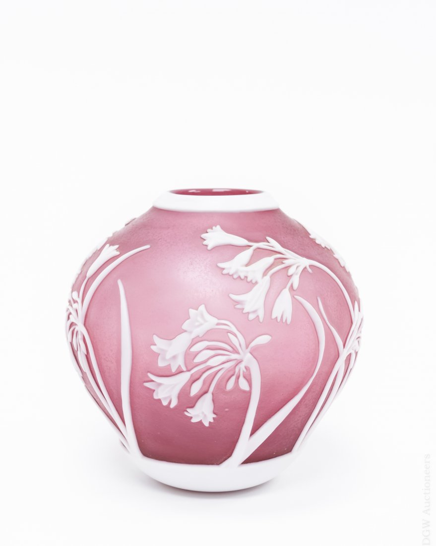 Orme, Cook Cameo Glass Vase.: Orme Cameo glass vase. Ruby glass with intricately rendered flowers in white. Marked Orme. Etched Cook ’84. (Approx. 5 ½" tall, 6" diameter). From the collection of Eric Sinizer.