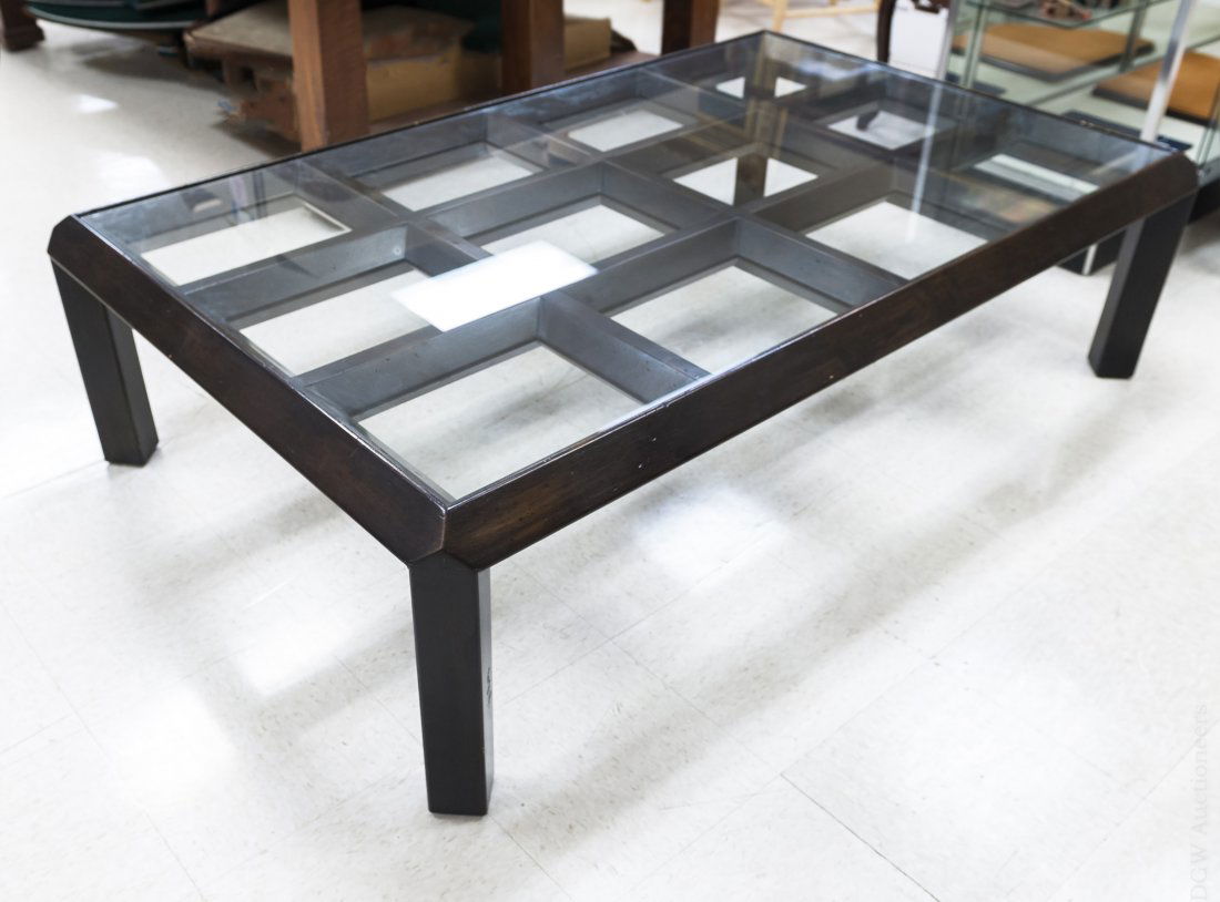 Phyllis Morris Designer Coffee Table.: Phyllis Morris designer glass top coffee table with lattice form top. Signed Phyllis Morris on the leg. (Approx. 17" tall, 64" x 40").