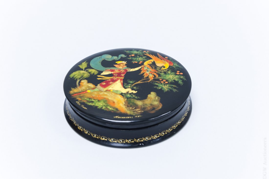 Malinkina Palekh Russian Lacquer Box.: Malinkina Palekh Russian lacquer box. Circular box with removable lid depicting Ivan and the Firebird. Marked N930 Palekh, signed Malinkina 1973. (Approx. 1" tall, 4" diameter).