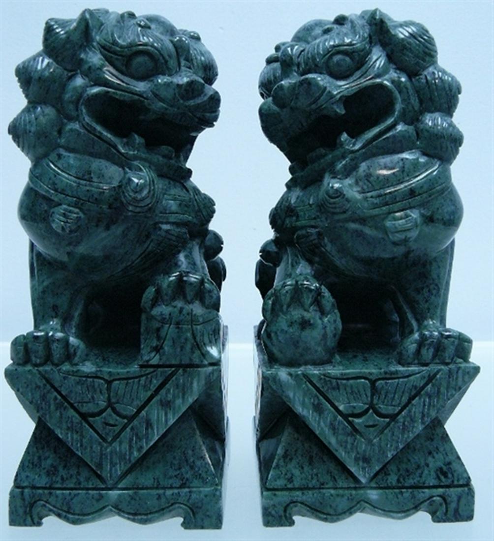 Pair Of 8" Green Jade Foo Dogs / Lions: Pair Of 8" Green Jade Foo Dogs / Lions ... Size: Wide 3", Deep 4", High 8" ... Pair Of Jade Foo Dogs, In Light Green And Dark Green. Comes In A Pair. A Male And Female. Male Is Stepping On A Ball And 