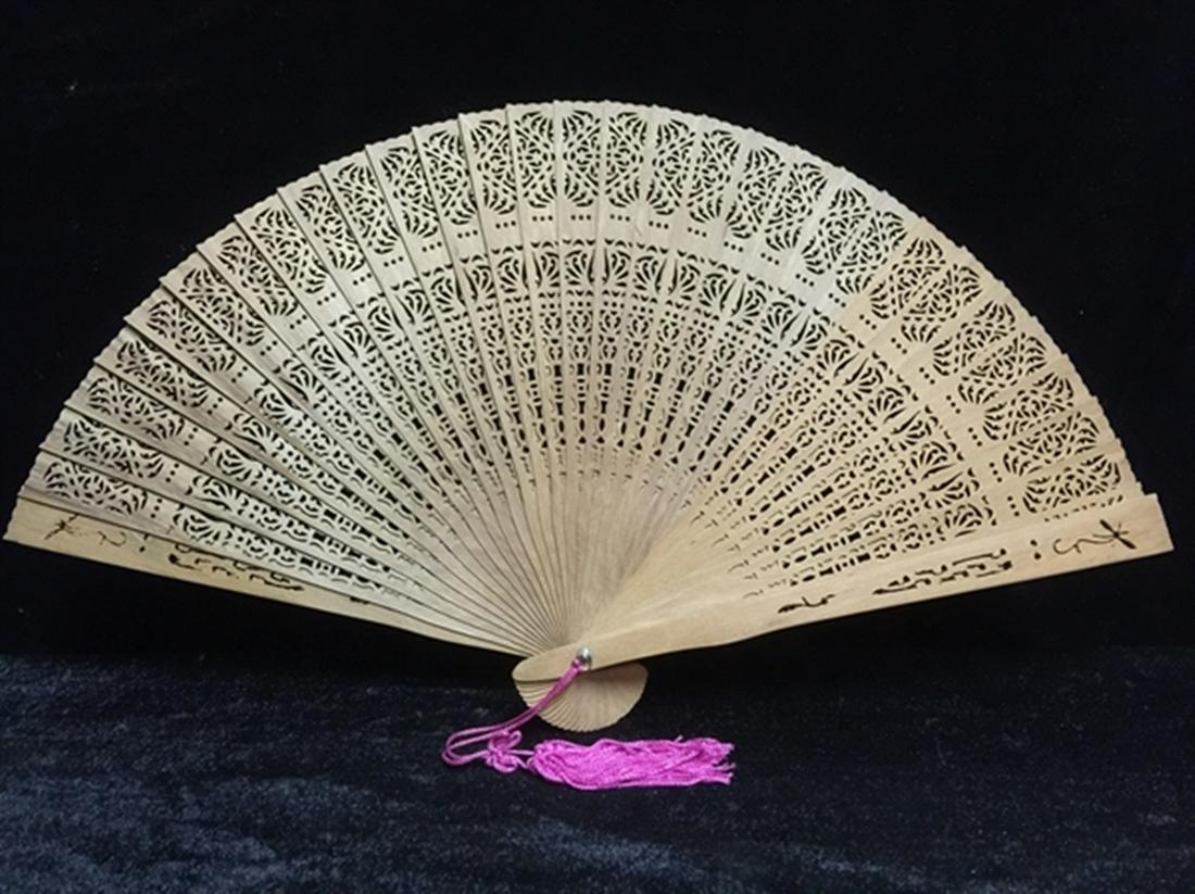 16" SANDAL WOOD FAN: 16" Sandal Wood Fan ___open Size: Long 16", High 9", Deep 1"___sandal Wood Fan. Smells Very Good. All Hand Carved From Natural Sand Wood.